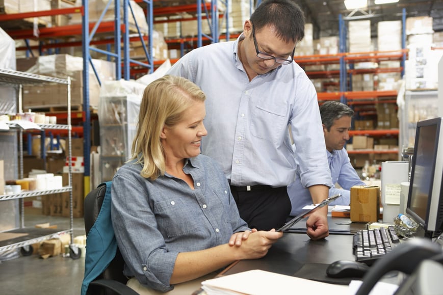 Gemba with lady at desk
